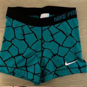 Nike Pro teal spandex shorts size small.